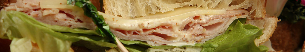 Eating Gluten-Free Sandwich at Ike's Love & Sandwiches restaurant in Tempe, AZ.
